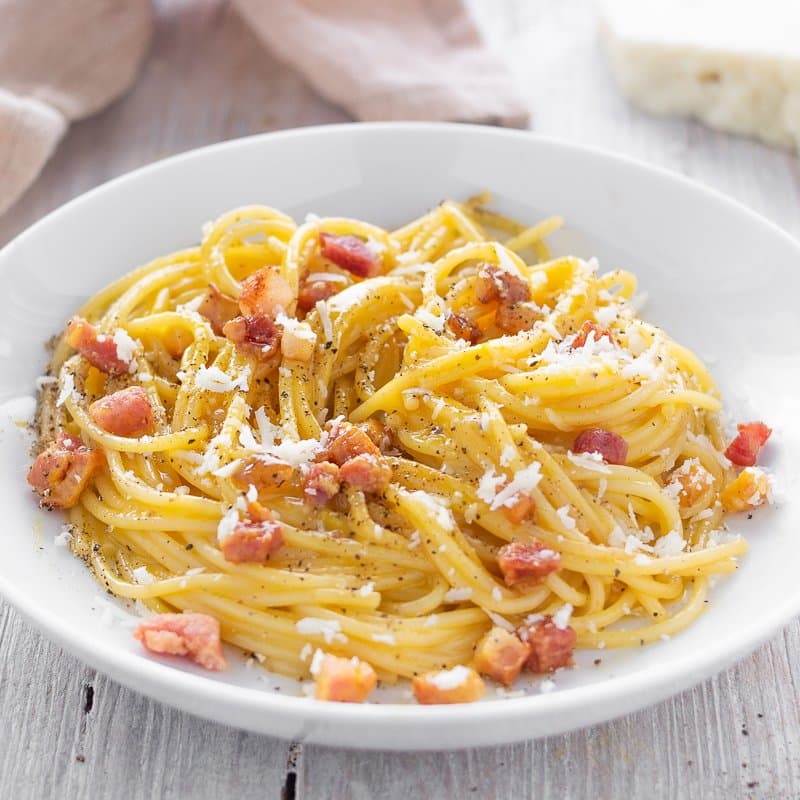 A comforting homemade pasta dinner on a wooden table